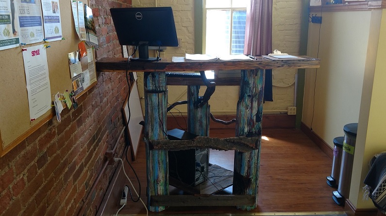 Custom driftwood desk inside of local yoga studio